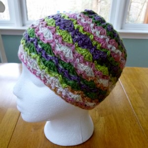 https://crochetbydarleenhopkins.com/category/2014-chemo-hat-challenge/  Shells and Trellis hat for Halos of Hope