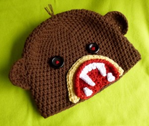Zombie Monkey Hat crochet pattern by Darleen Hopkins http://www.ravelry.com/projects/DarleenHopkins/zombie-sock-monkey-attacks-hat-with-or-without-earflaps-2