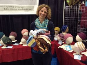 This is me donating hats I made.