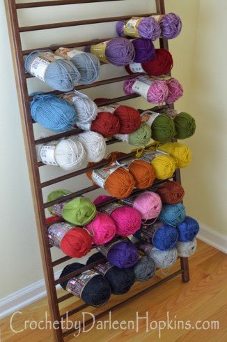 yarn storage out of repurposed crib #CbyDH