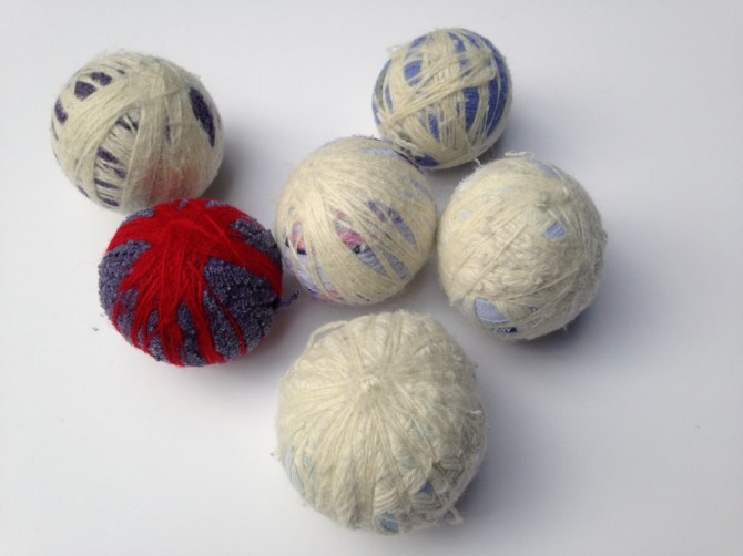 homemade dryer balls with wool and yarn scraps